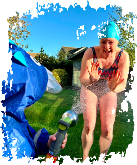 Woman getting sprayed by hose