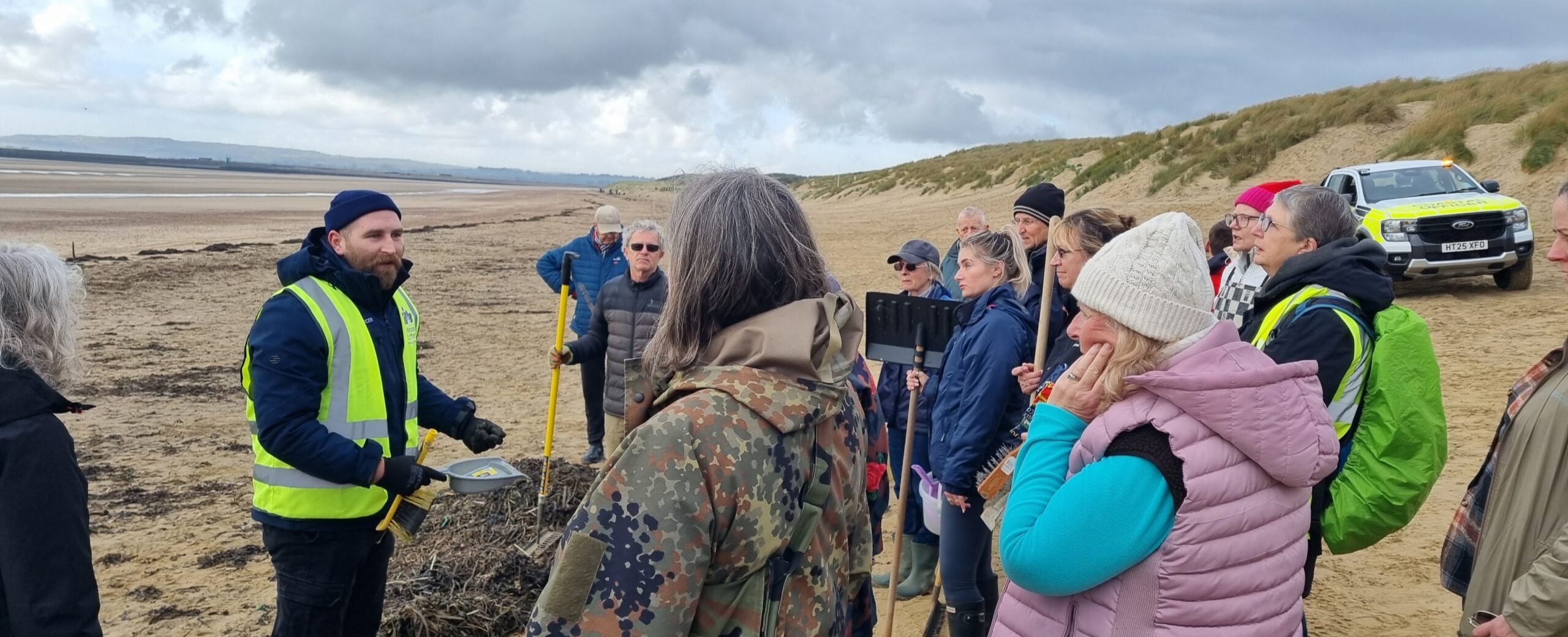 Volunteers cleaning up Camber Sands beach