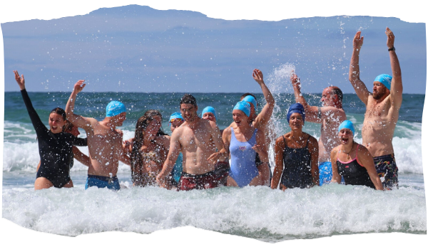 Friends splashing in the sea