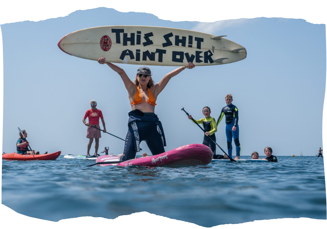 woman holding surfboard