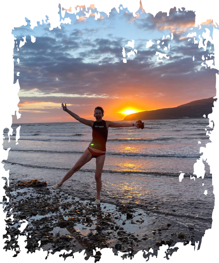 woman on beach at sunset