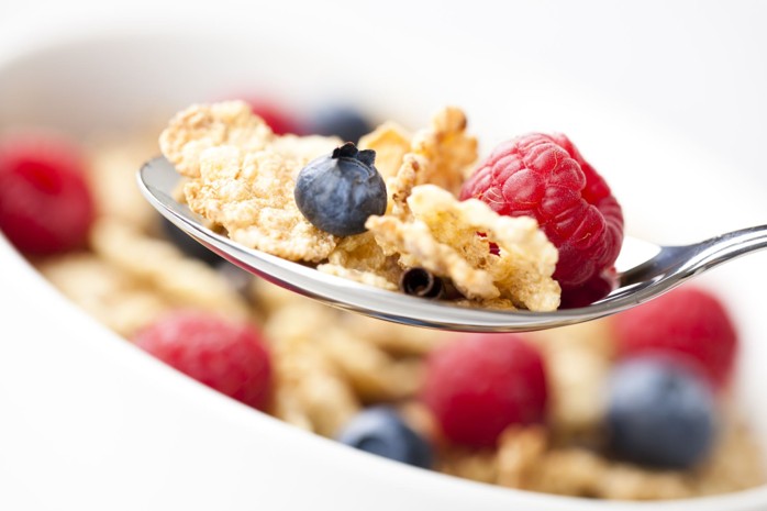 Spoonful of cereal and berries