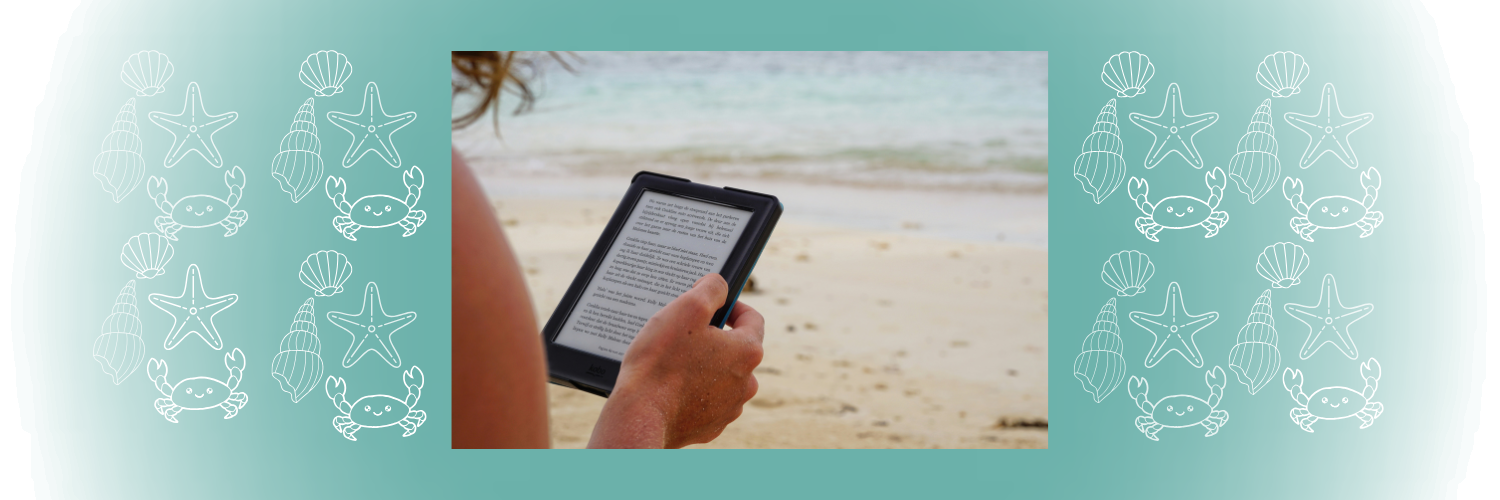 Person on a beach reading an eBook