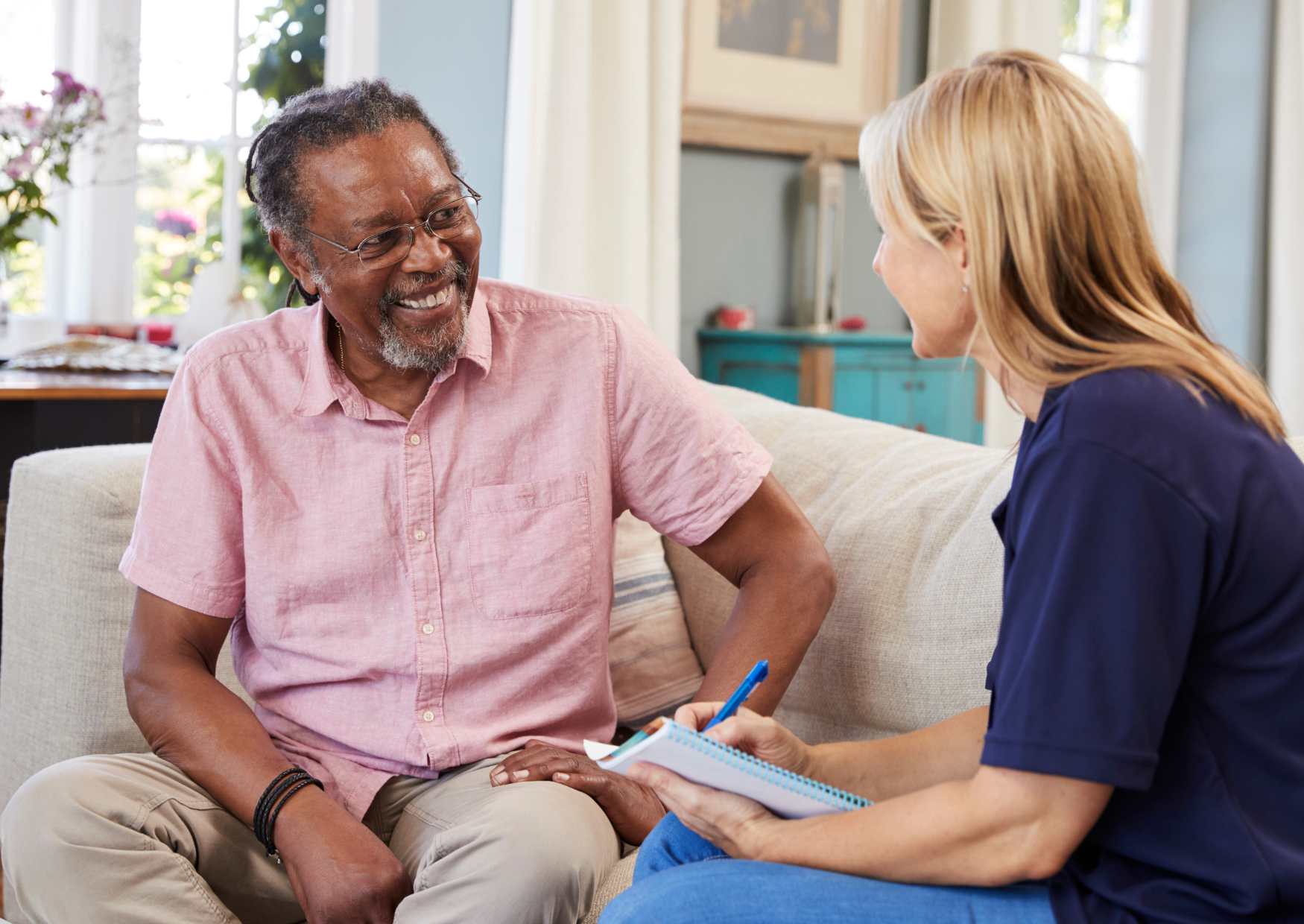 Image of an older person with a carer