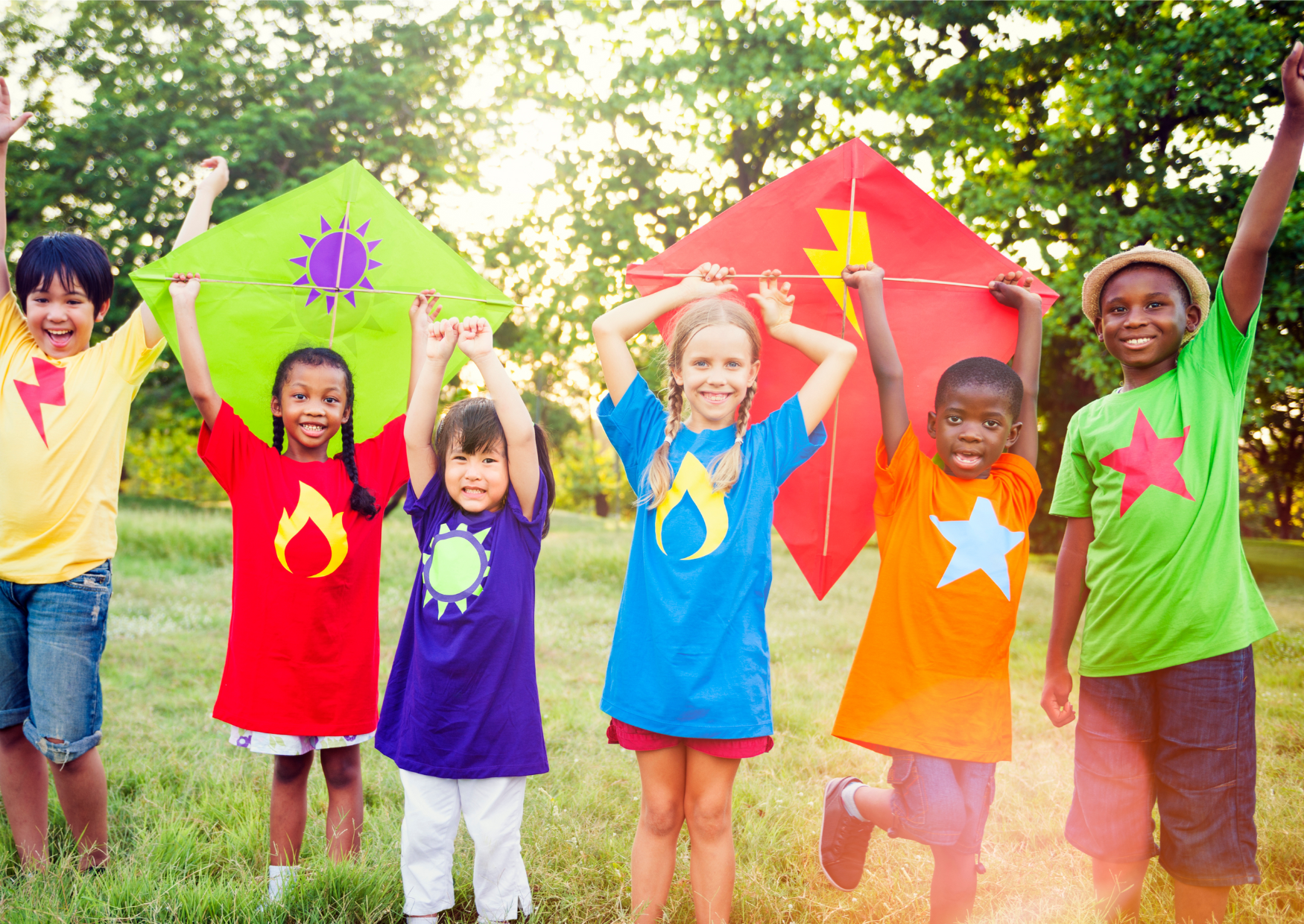 Happy children playing with kites