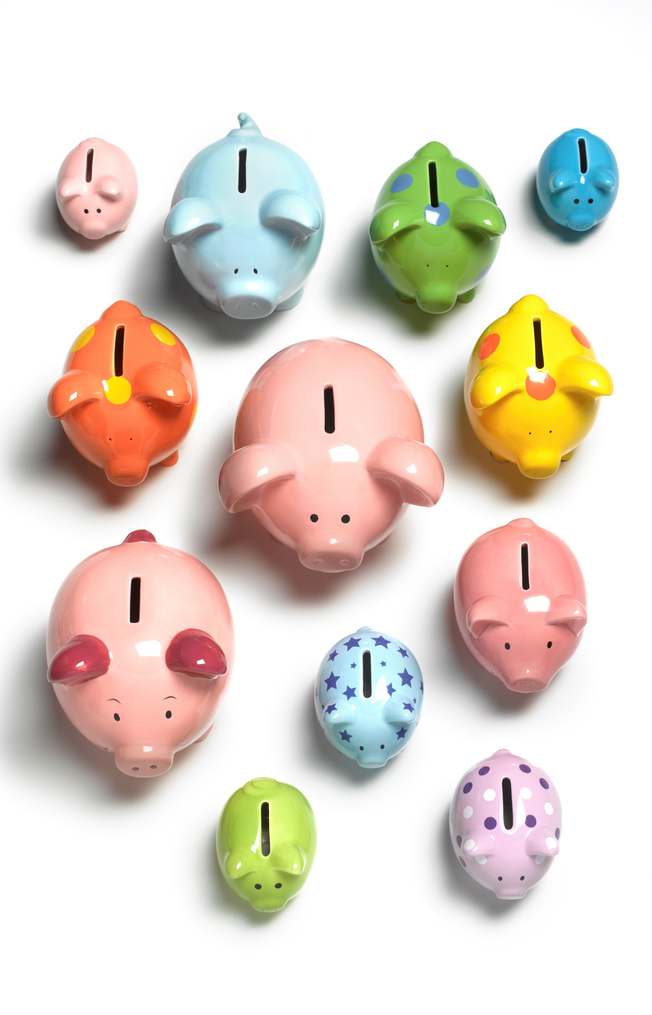 A collection of brightly coloured piggy banks