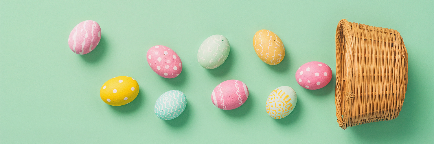 Image shows a woven basket of colourful easter eggs knocked over