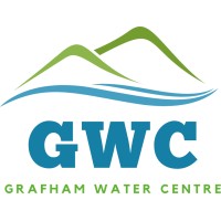 Logo for Grafham Water Centre, featuring stylized green and blue mountain-and-water shapes above large blue “GWC” initials. Green text below spells “GRAFHAM WATER CENTRE,” identifying an outdoor water recreation facility.