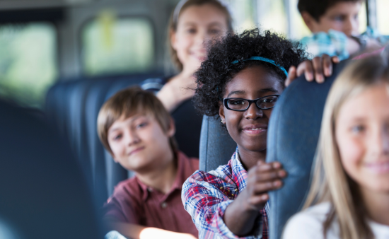 children on minibus