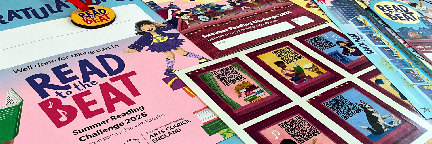 Image shows the various Summer Reading Challenge materials for this year, including a medal, certificate, sticker booklet, bookmarks and stickers.