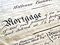 An old-fashioned mortgage deed on crinkly paper, with the word 'Mortgage' prominent in Gothic script.