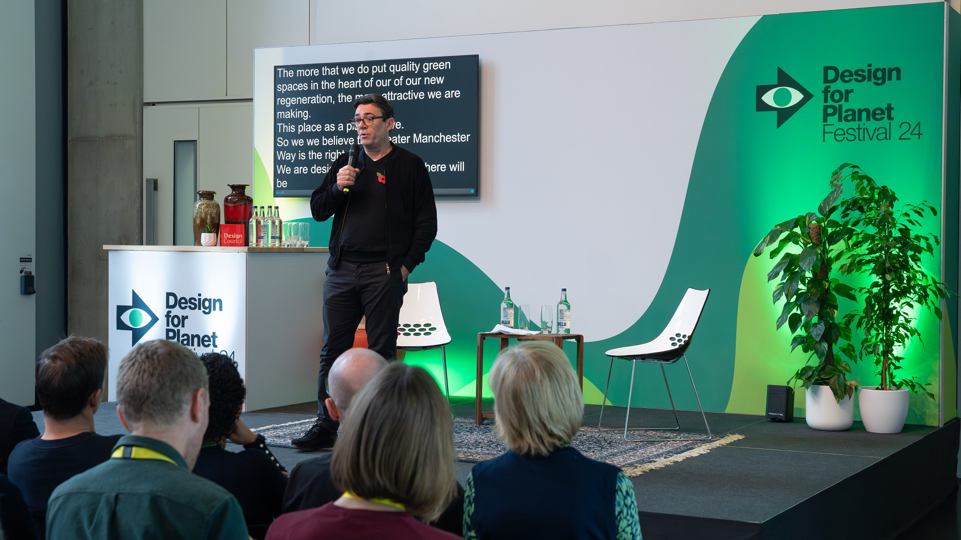 Andy Burnham speaking on stage